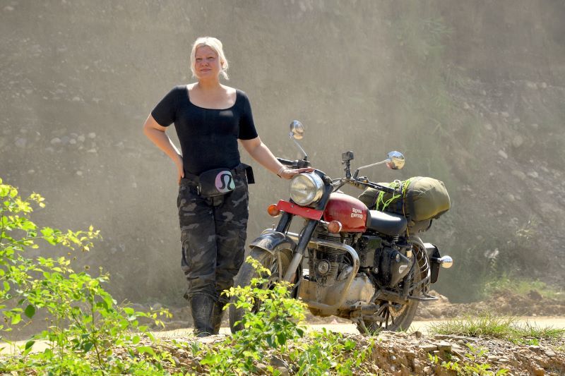 Phoebe on an adventure riding a motorcycle in Thailand.