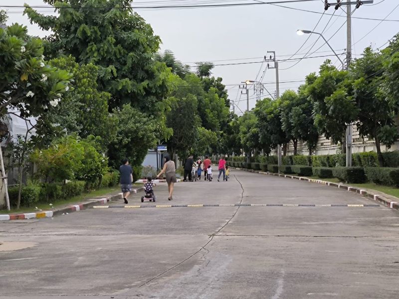 kids playning in a gated community in bangkok suburbs