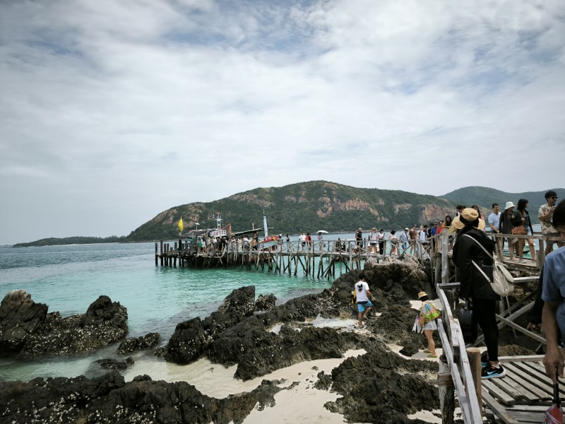Island pier with tourists at Koh Samet