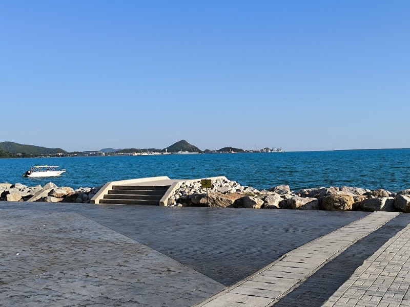 Seafront promenade with a boat in Hua Hin