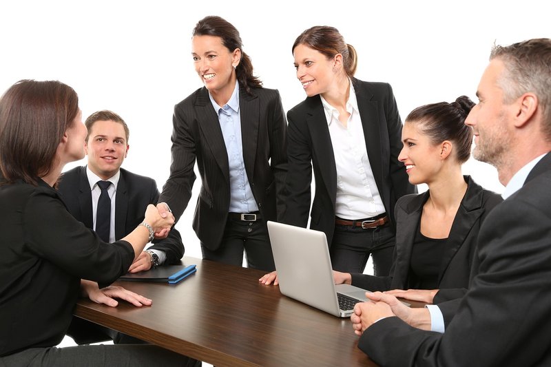 Business team meeting and handshake