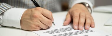 Signing a power of attorney document in Thailand