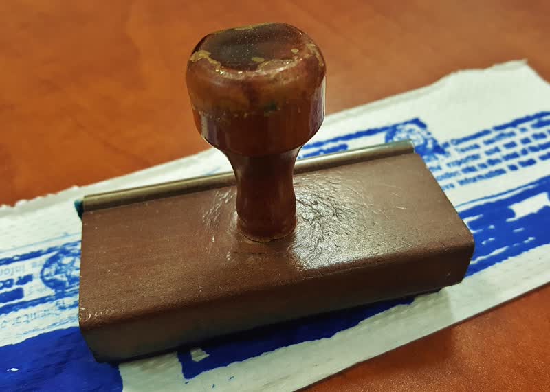 A notary rubber stamp used to certify a power of attorney signature