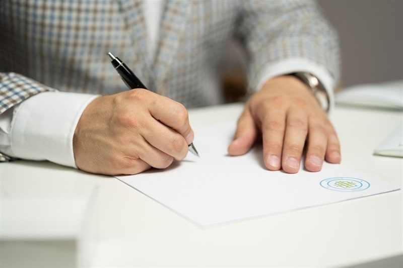 Person signing a service agreement