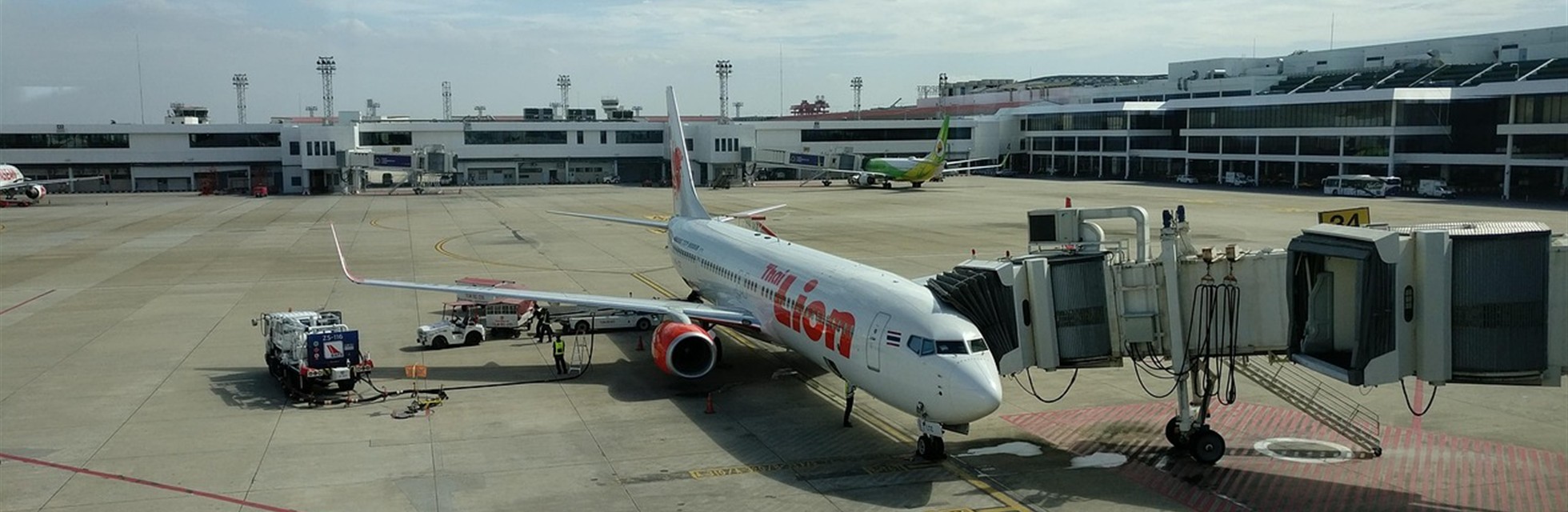 Aircraft at a Thai airport gate