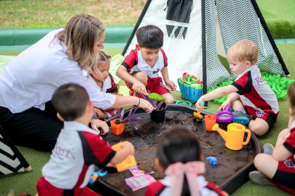 Early years pupils in an outdoor lesson at Regents International School Bangkok
