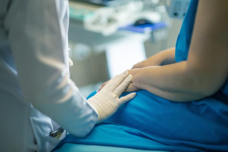 A patient receiving treatment at a hospital