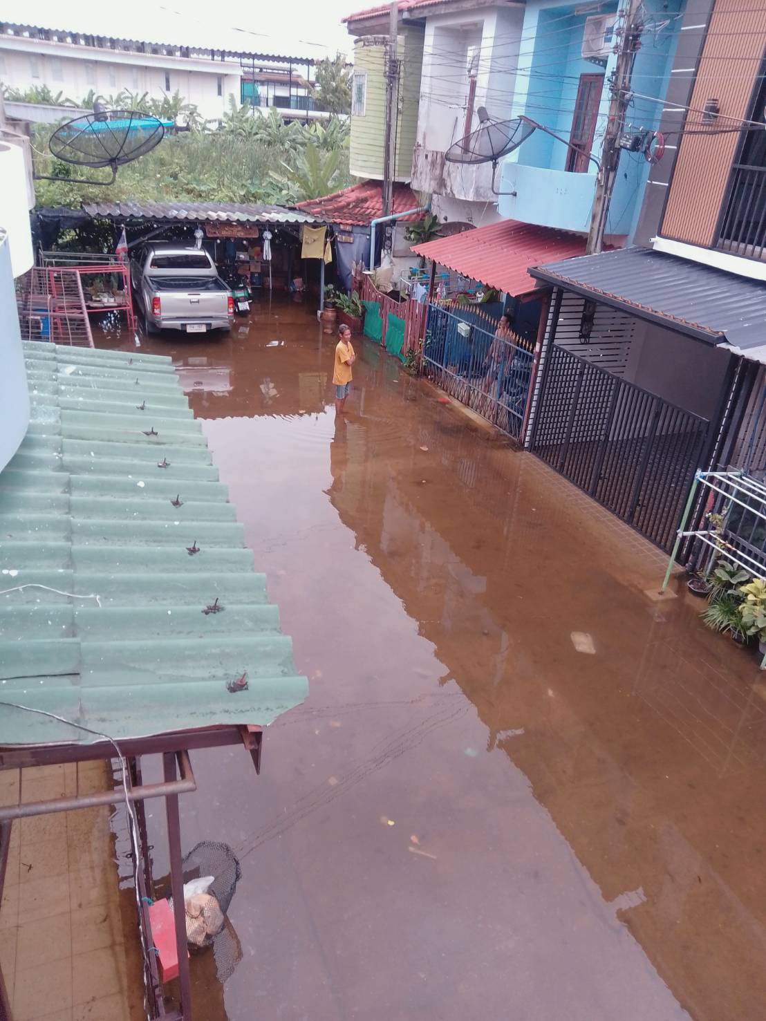 Aerial view of a flooded residential soi in Bangkok