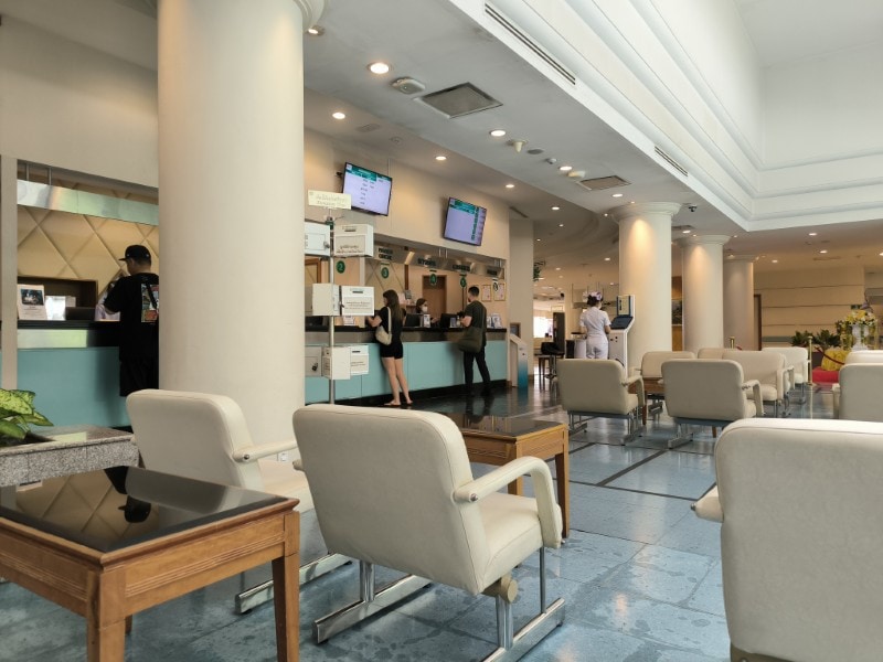 Reception and billing counter at a private hospital in Bangkok