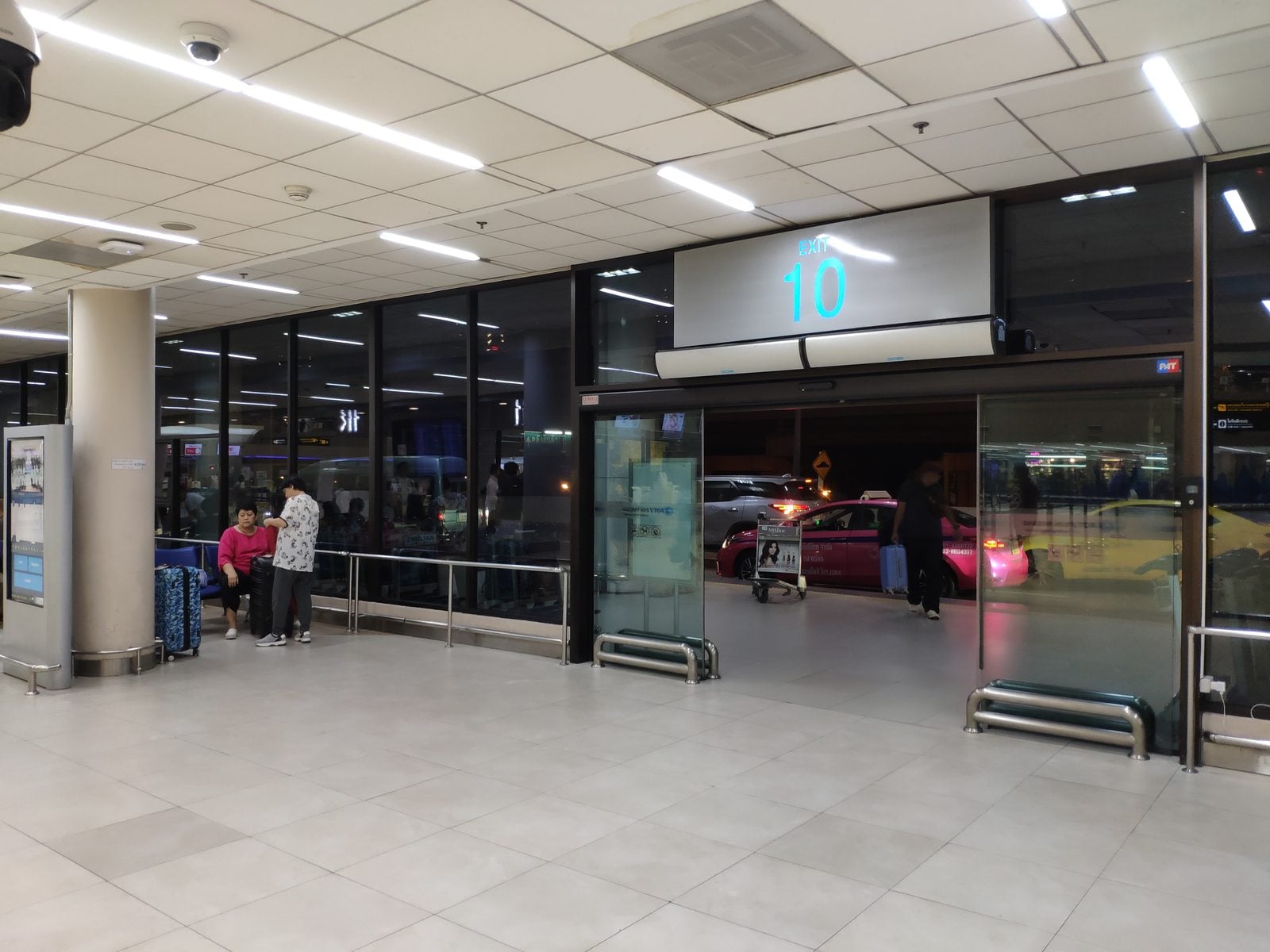 Gate 10 on the arrivals floor at Don Mueang Airport, the exit to the taxi queue