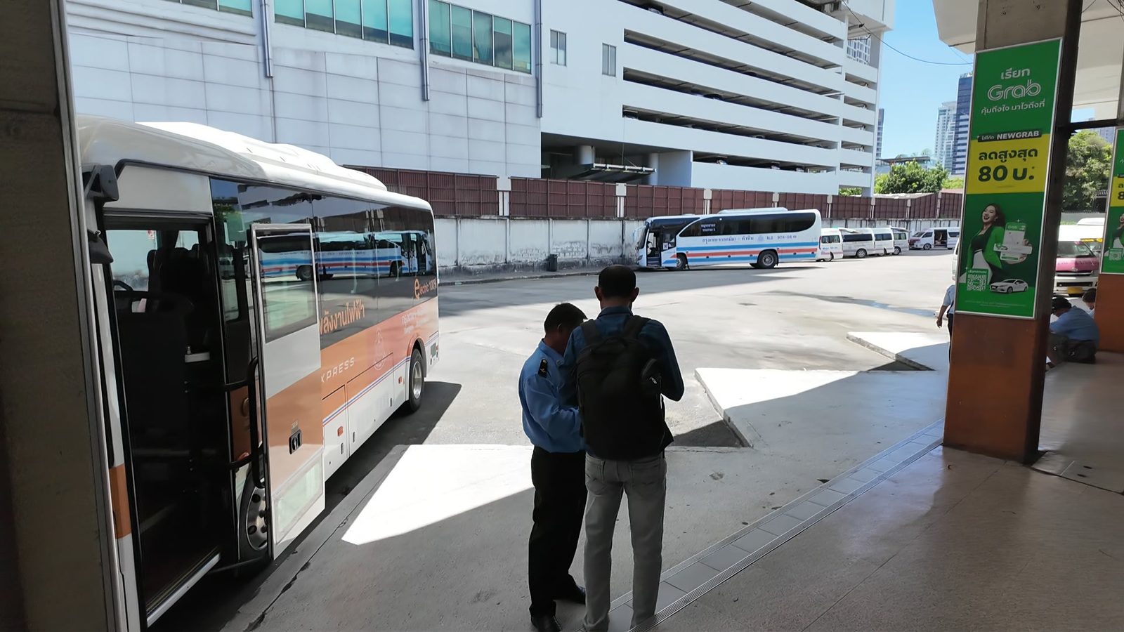 Electric NEX Express buses parked at the Eastern Bus Terminal in Ekkamai