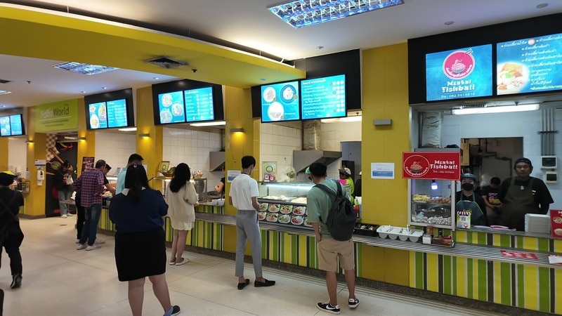 Lunch queue at a food court stall inside the Chaeng Watthana Government Complex