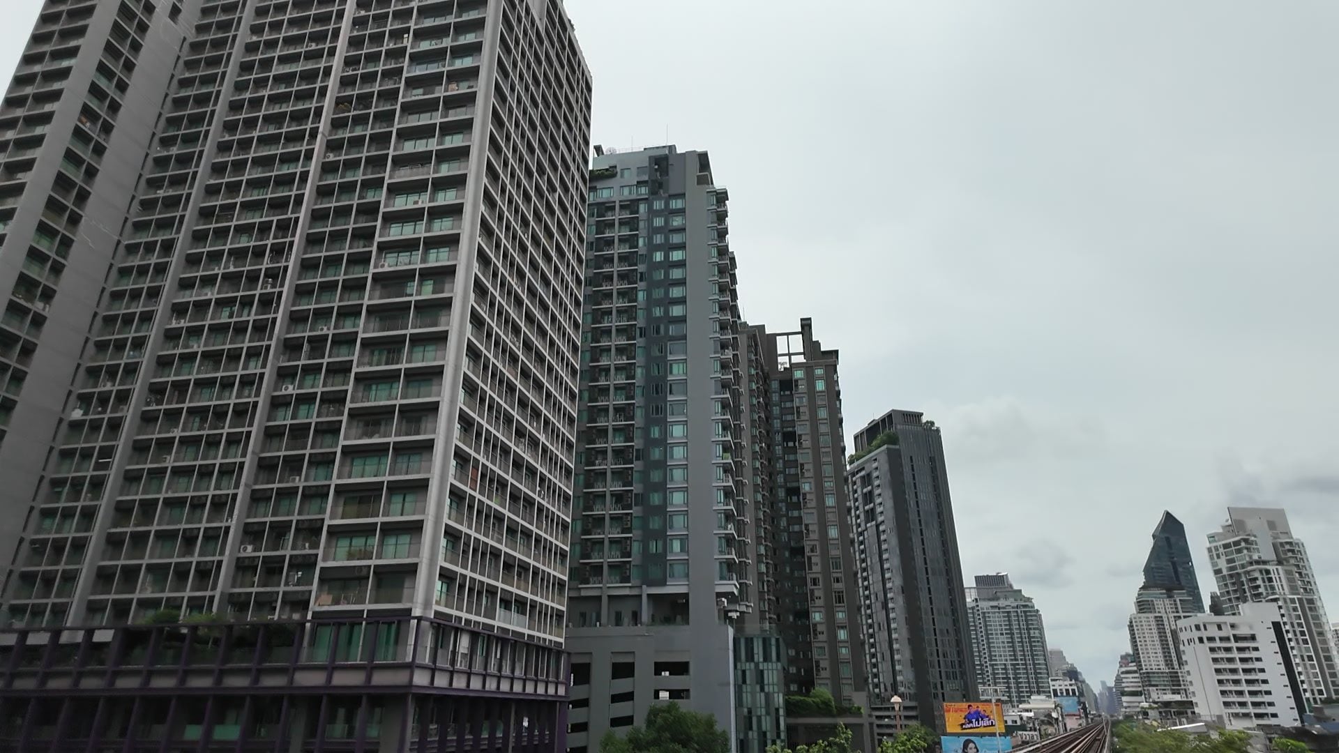 Condo towers beside the BTS Sukhumvit Line near Thong Lo station