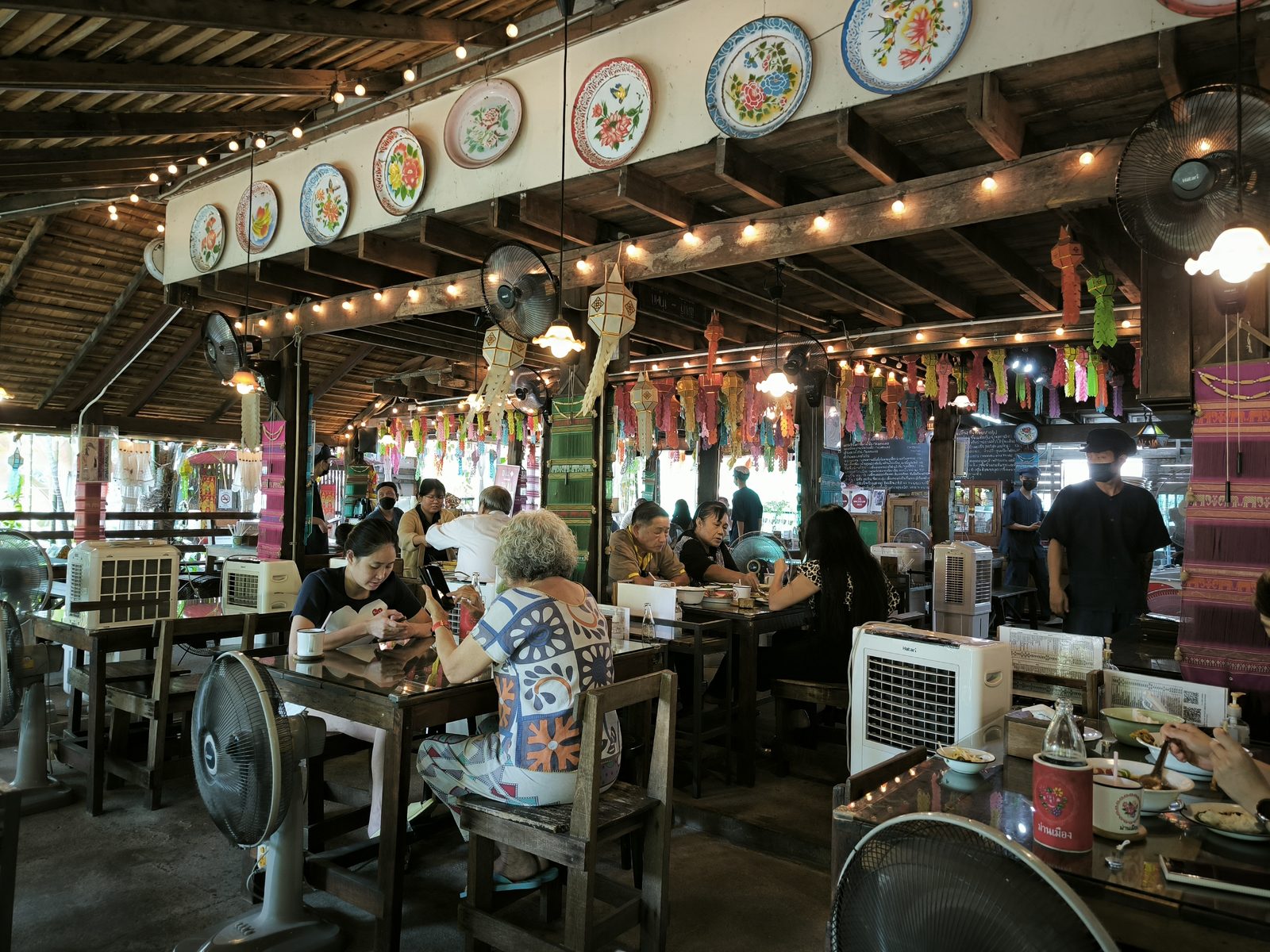 Diners in a northern Thai restaurant in Ramkhamhaeng