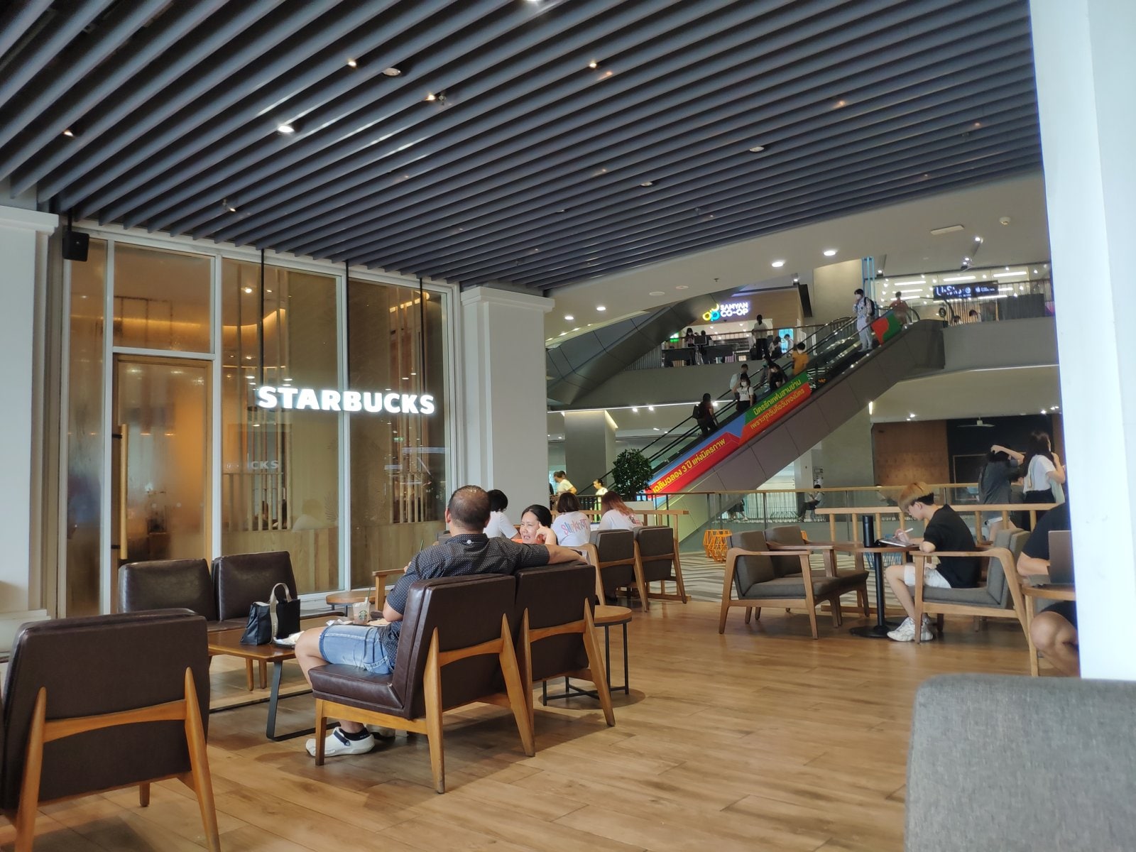 Starbucks at Sam Yan station, Bangkok, with escalators behind