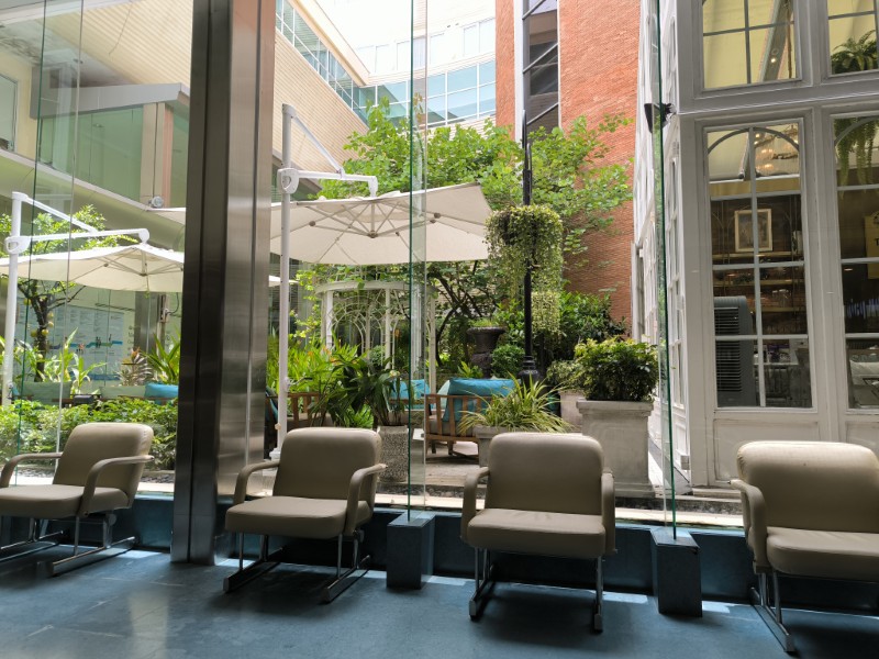 Outpatient waiting area with garden view at Samitivej Hospital in Bangkok