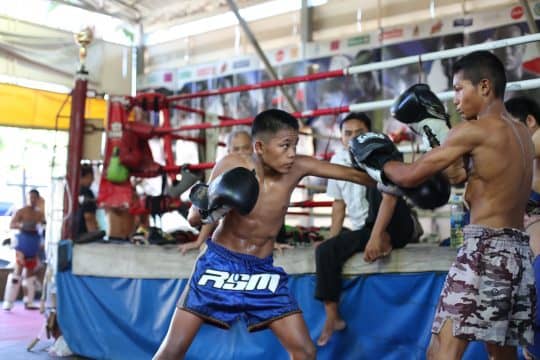 two fighters sparring at sangmorakot gym